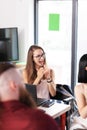 Business people having a creative meeting. Successful multiethnic multiracial colleagues in an office. Smiling businesswoman Royalty Free Stock Photo