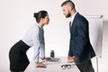 Business people having disagreement and looking at each other in office Royalty Free Stock Photo