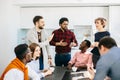 Business people having fun in the kitchen with modern interior Royalty Free Stock Photo