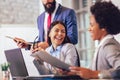 Business people having meeting around table in office Royalty Free Stock Photo