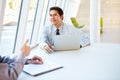 Business people Having Meeting Around Table In Modern Office Royalty Free Stock Photo