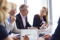 Business people having serious conversation in the conference room Royalty Free Stock Photo