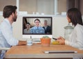 Business people having a video call with colleague on computer Royalty Free Stock Photo