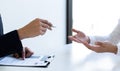 Business people hold resume documents, interviews for the work experience of young men applying as financial accountants for the c Royalty Free Stock Photo