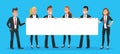 Business people holding banner. Man and woman office workers in suits and ties with blank signboard for text Royalty Free Stock Photo