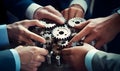 Business People holding Gears and Teamwork Concept, Business team connect pieces of gears. Teamwork, partnership and integration c Royalty Free Stock Photo