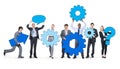 Business People Holding Gears Together Concept Royalty Free Stock Photo