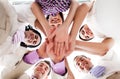 Business people holding hands together in a circle Royalty Free Stock Photo