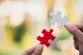 Business people Holding Jigsaw Puzzle, group of business people using a jigsaw puzzle to demonstrate the need to work in the same Royalty Free Stock Photo