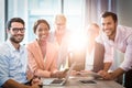 Business people holding laptop, mobile phone and digital tablet Royalty Free Stock Photo