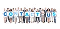 Business People Holding Placards Forming Contact Us Royalty Free Stock Photo