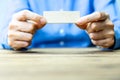 Business people holding wooden block. Royalty Free Stock Photo