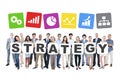 Business People Holding The Word Strategy Royalty Free Stock Photo