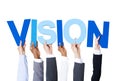 Business People Holding the Word Vision Royalty Free Stock Photo