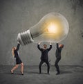 Business people hold a light bulb. concept of new idea and company startup Royalty Free Stock Photo