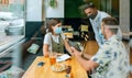 Business people at an informal business meeting in a cafe Royalty Free Stock Photo