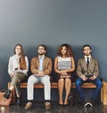 Business people, interview waiting room and recruitment for job while sitting in line. Bored, technology and Royalty Free Stock Photo