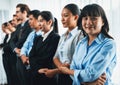 Business people joining hand together and standing in line. Meticulous Royalty Free Stock Photo