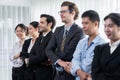 Business people joining hand together and standing in line. Meticulous Royalty Free Stock Photo