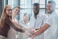 Business people joining hands in the office. concept of teamwork and partnership. double exposure Royalty Free Stock Photo