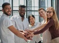 Business people joining hands in the office. concept of teamwork and partnership. double exposure Royalty Free Stock Photo