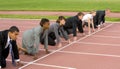 Business People Kneeling at the Starting Line Royalty Free Stock Photo