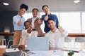 Business people, laptop and meeting with thumbs up for success, good job or teamwork planning at office. Group of Royalty Free Stock Photo