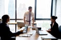 Business people with leader discussing together in conference room during meeting at office. Royalty Free Stock Photo