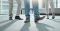 Business people, legs and team standing at office in meeting, interview or waiting room. Closeup of corporate employees Royalty Free Stock Photo