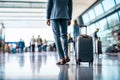 Business people with luggage standing in line at the airport and waiting their turn to go to the check-in counter or boarding gate Royalty Free Stock Photo