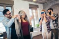 Business people making team training exercise during team building seminar, play a game of trust Royalty Free Stock Photo