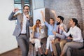 People making team training exercise during team building seminar singing karaoke. Indoor team building activities Royalty Free Stock Photo