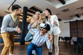 Business people making team training exercise during team building seminar using VR glasses Royalty Free Stock Photo