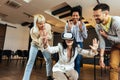 Business people making team training exercise during team building seminar using VR glasses Royalty Free Stock Photo