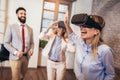 Business people making team training exercise during team building seminar using VR glasses Royalty Free Stock Photo