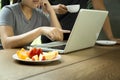 Business people man and woman team work with laptop with fresh f