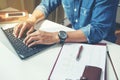 Business People Marketing Strategy Analysis Concept. Male hands typing on the notebook keyboard.Concept of young people work Royalty Free Stock Photo