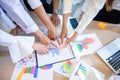 Business people are meeting and graphing business growth on a desk