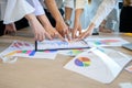 Business people are meeting and graphing business growth on a desk