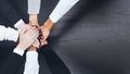 Business people, meeting and hands together above on mockup for teamwork, unity or collaboration. Top view of group Royalty Free Stock Photo