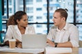 Business people are meeting in office city building view. Group of Business team working and share ideas about project to partners Royalty Free Stock Photo