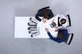 Business people at meeting, view from above. Bookkeeper or financial inspector making report, calculating or checki