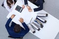 Business people at meeting, view from above. Bookkeeper or financial inspector making report, calculating or checki