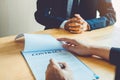 Business people negotiating a contract between two colleagues Royalty Free Stock Photo