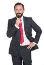 business, people and office concept - happy smiling businessman in suit. Bearded businessman in blue suit and red tie on white