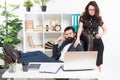 Business people and office staff. secretary personal assistant. Typical office life. Man bearded hipster boss sit Royalty Free Stock Photo