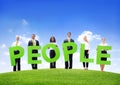 Business People Outdoors Holding the Text People Royalty Free Stock Photo