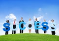 Business People Outdoors Holding Text Success Royalty Free Stock Photo