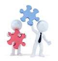 Business people with pieces of puzzle. Teamwork concept. Isolated. Contains clipping path Royalty Free Stock Photo