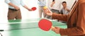 Business people playing ping pong in office, closeup. Banner design Royalty Free Stock Photo